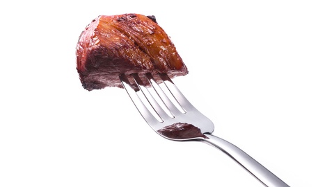 St&uuml;ck Fleisch auf einer Gabel &copy; Shutterstock