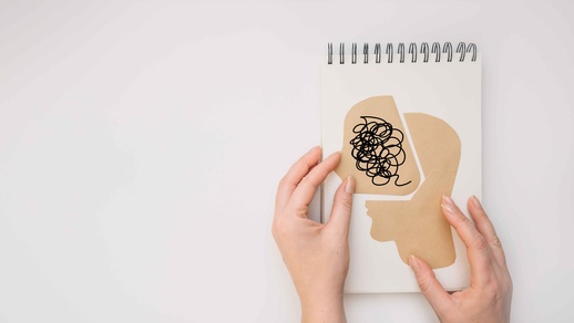 Ein Zeichenblock, auf dem ein Kopf abgebildet ist © Shutterstock