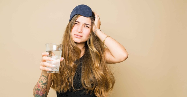 Frau mit Kopfschmerzen  ©  iStock